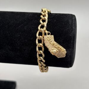 Vintage Monet California Charm Bracelet Gold Tone Twist Curb Link State Souvenir